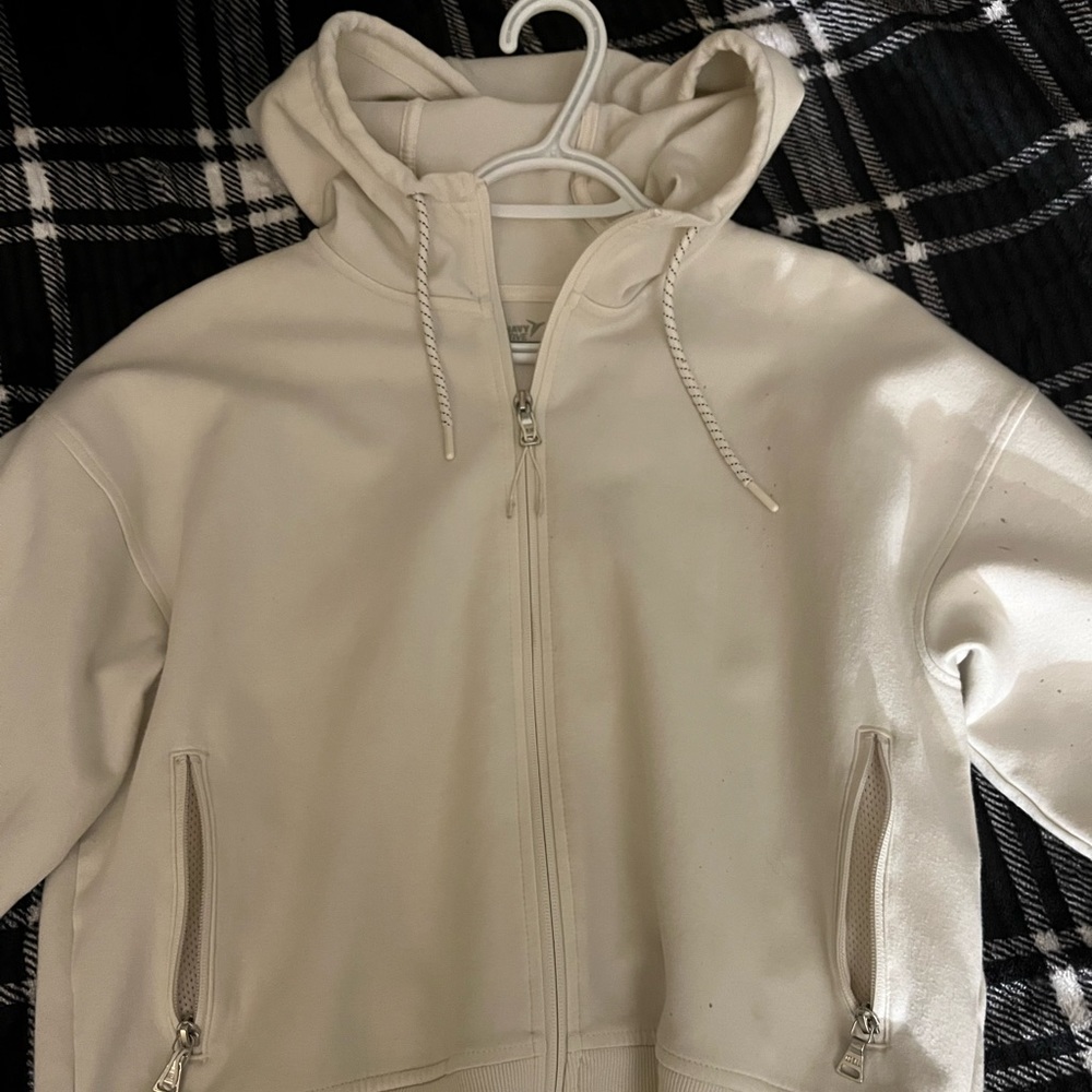 White/cream zip up sweater